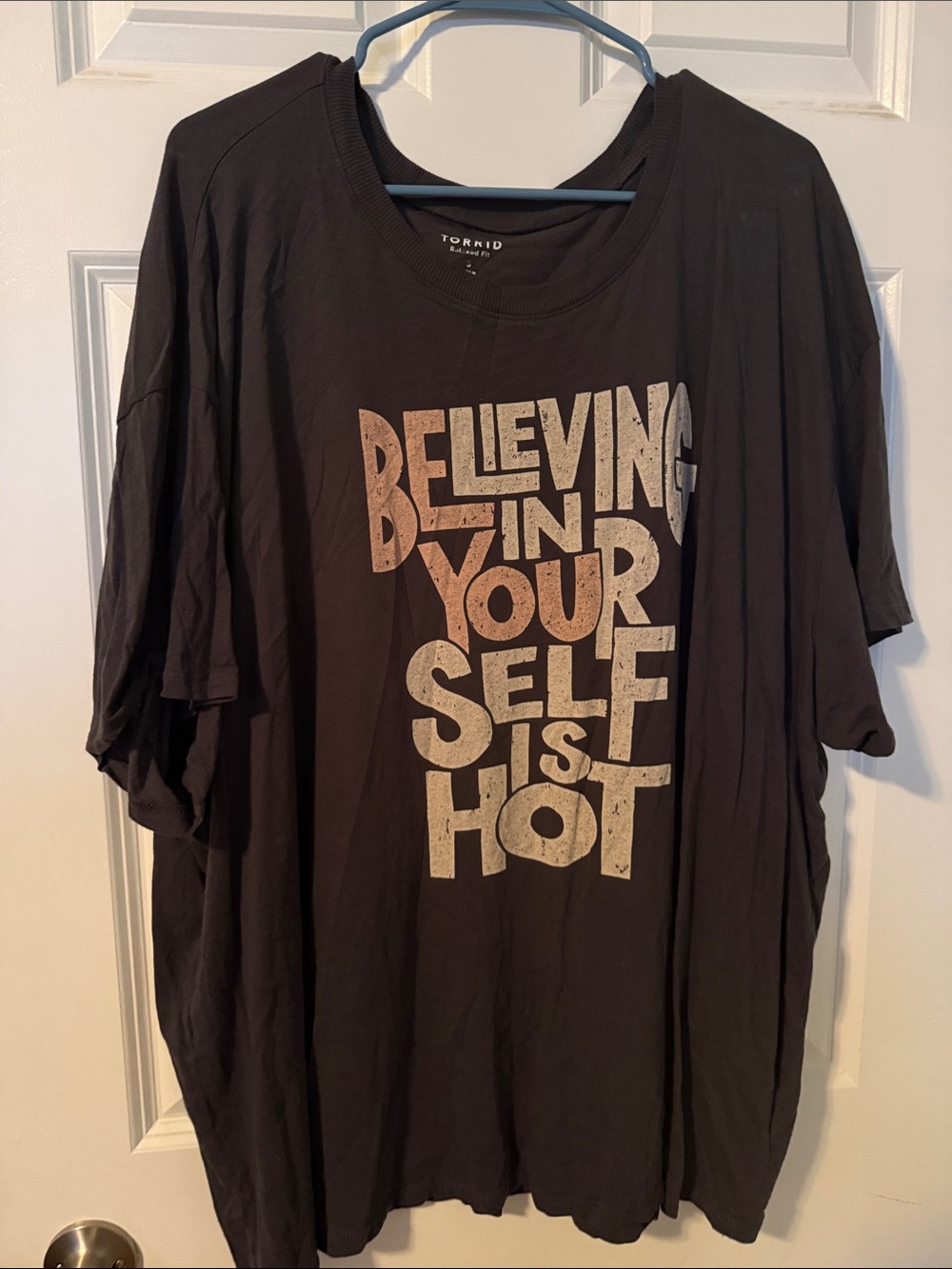 torrid Black Tee with Beige Positive Graphic